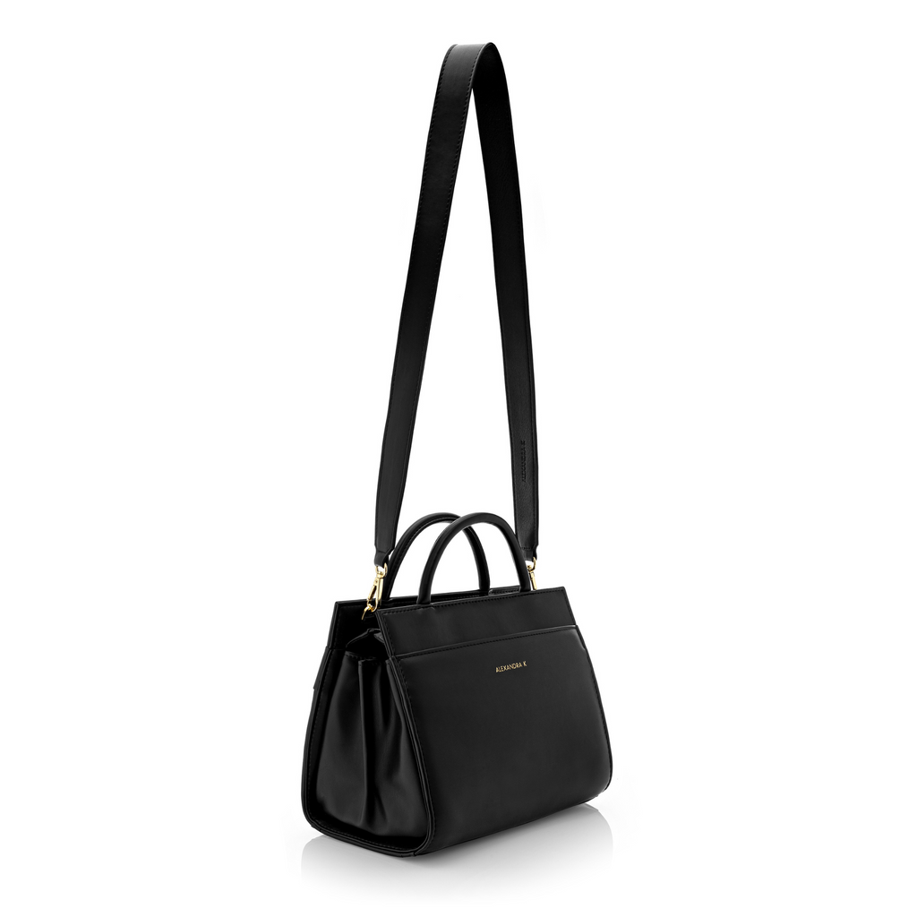 medium-sized black handbag with strap